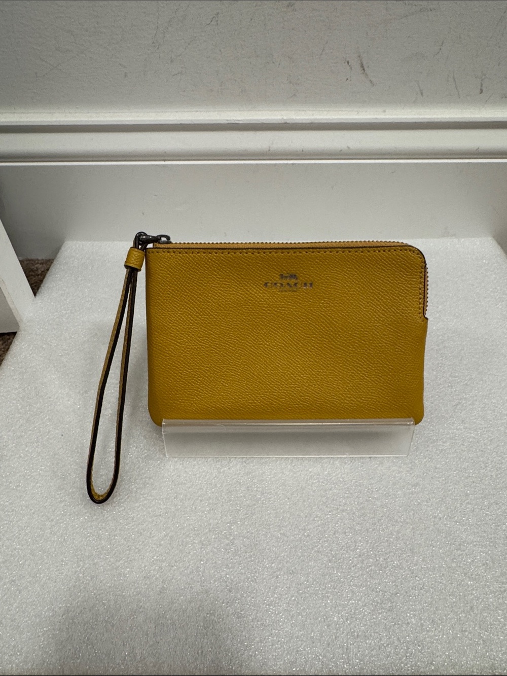 Coach mustard Yellow Pebbled Leather Wristlet wallet
